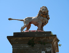 Crowned Lion Standing on a Crown