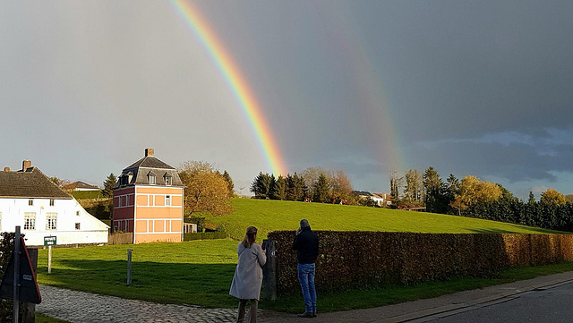 dazzling double rainbow colours the sky