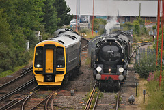 The old and the new.  Merchant Navy "British India Line" waits while a modern diesel leaves Weymouth station.
