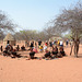 Namibia, Tourists in the Traditional Himba Village of Onjowewe