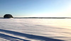 snowmobile crossing the lake