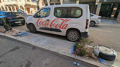 Coca-Cola sur blanc et sur roues