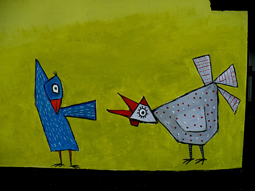 Bird discussion on the wall