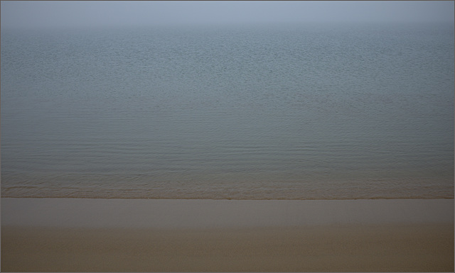 Foggy drizzly beach