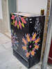 Electricity box and beer can.