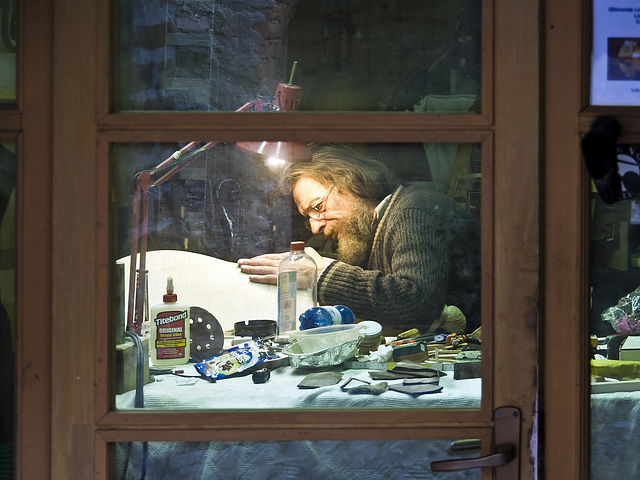 Through the window, the craftsman lutist at work - The medieval village of the Ricetto, Biella