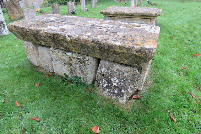 hazleton church glos,heavyweight c16 tomb with an odd hollow to the left of the stepped cross incised in the top