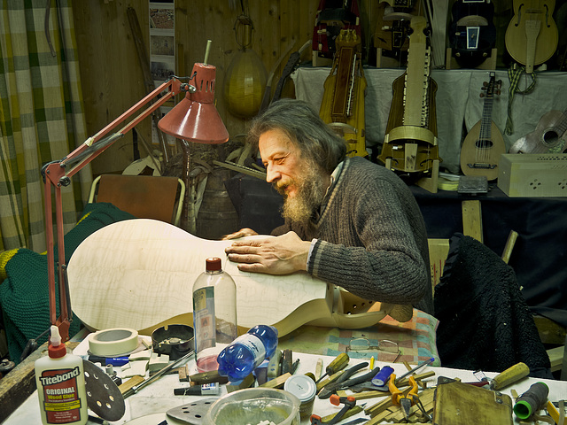 Expert hands shape the wood to give to the musical instrument a unmistakable sound - The medieval village of the Ricetto, Biella