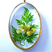 Oval shape with green leaves and yellow flowers
