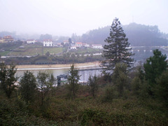 A view to Rocas fluvial beach, in a rainy day.