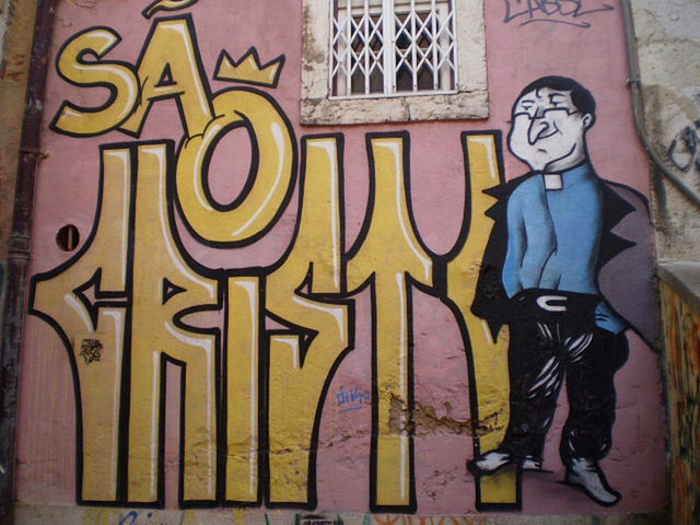 Street art at Alfama, Lisbon - Saint Christopher.