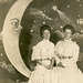 Women Posing with a Paper Moon