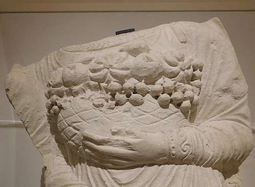 Detail of a Relief of a Banquet Attendant Carrying Fruit and Vegetables in the Metropolitan Museum of Art, June 2019