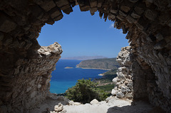 Rhodes, The Monolithos Castle, Looking through the Ruins of St.Panteleimon Church to the Armenistis Сape