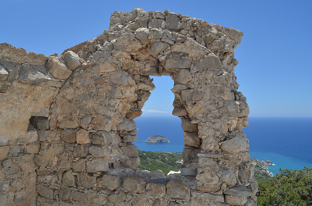 Rhodes, The Monolithos Castle, Looking through the Embrasure on the Stroggylo Islet