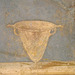 Detail of a Wall Painting with Dionysiac Symbols from the Praedia of Julia Felix in Pompeii in the Naples Archaeological Museum, July 2012