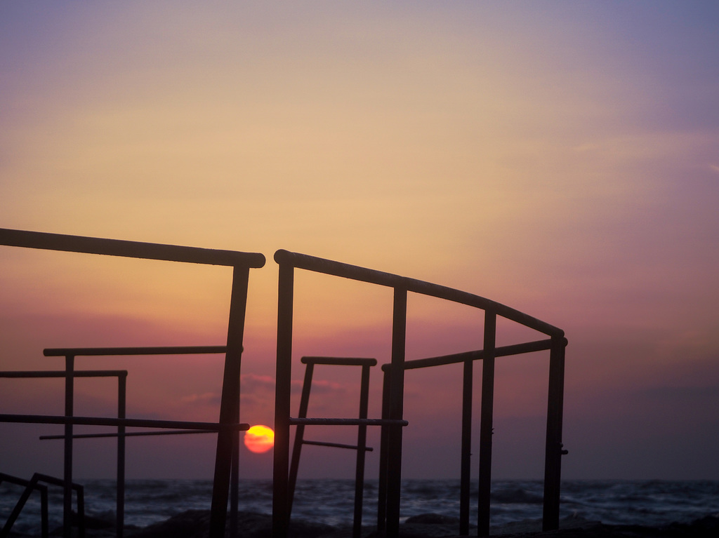 Sunset thru the fence