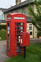 Red Walls of phone box and post box in Wimpole!