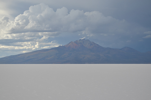 Bolivia, Volcano Tanupa (5400m) from Surface of the Salar de Uyuni