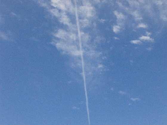 Blue sky and a vapour trail going to Canada maybe