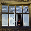 Photographer at a Window