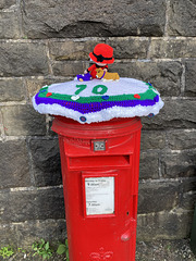 A Platinum Jubilee Postbox cosy