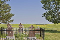 stone and wooden monuments