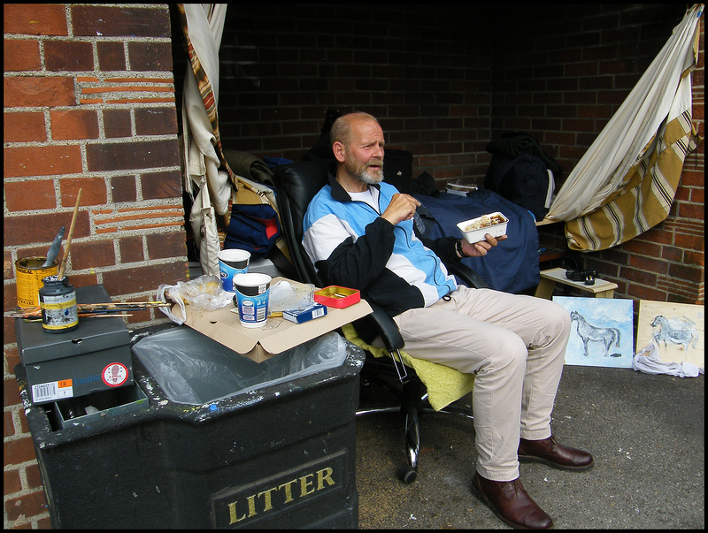 relaxing in the bus shelter