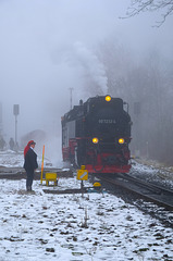 Locomotive 997232-4 and lady controller with red hat