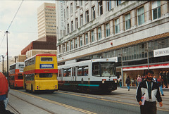 Manchester Metrolink 1019 and Bee Line RCN 104N in Market Street, Manchester – 14 Jul 1992 (167-24)