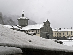 The Old Basilica of Oropa under the snow, Biella, Italy