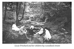 Lizzie Pritchard with her children in the woods c1920