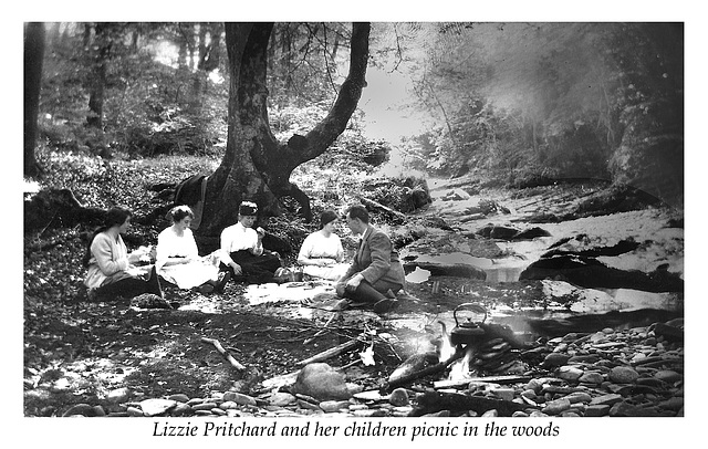 Lizzie Pritchard with her children picnic in the woods c1920