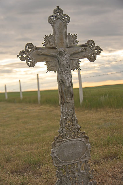 a cross at sunset