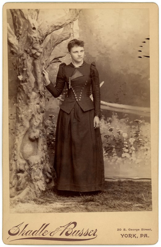 Young Woman with Gnarly Tree