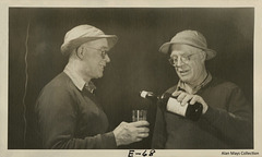 Man Pouring a Drink for His Other Self