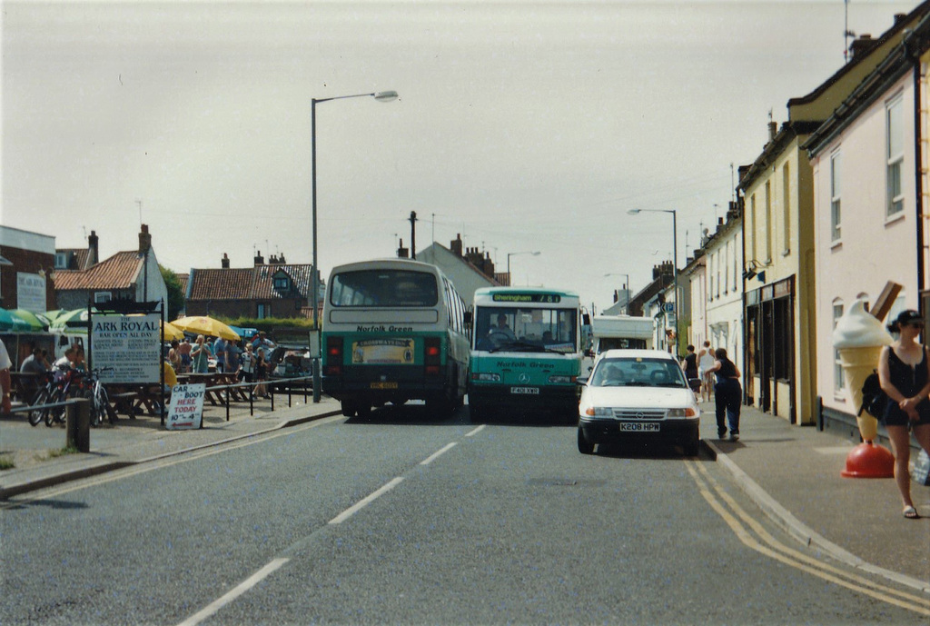 Norfolk Green (Go-West Travel) 105 (VRC 605Y) and 401 (F401 XWR) in Wells-next-the-Sea – 6 Aug 1999 (420-08A)