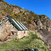 The stone cottage at the base of the cliff path to McFarquhar's Cave