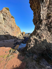 Rock pools at the base of the cliff path to McFarquhar's Cave