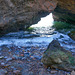 Rock formations at the bottom of the cliff patch down to McFarquhar's Cave