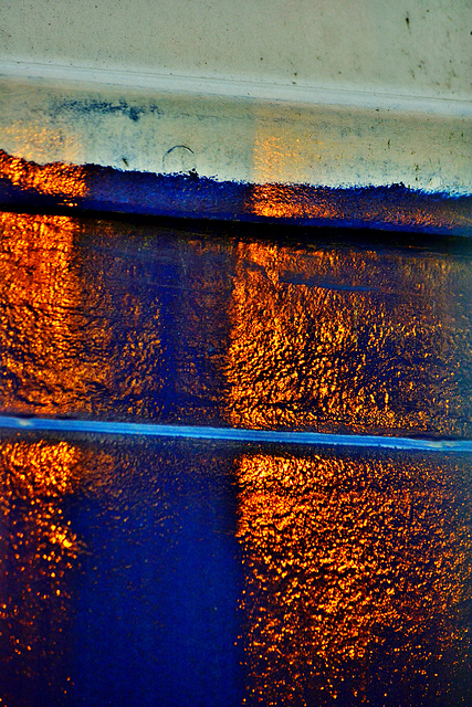 Shadows on the side of a boat