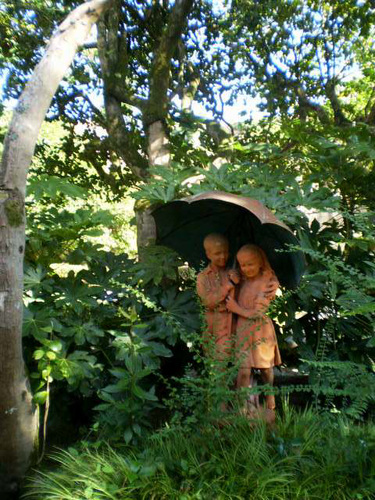 Sculptures with umbrella.