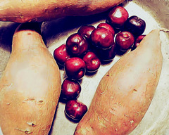 Arrangement of cherries and sweet potatoes