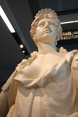 Polyhymnia waiting to be returned to the roof of the Clarendon Building, Broad Street, Oxford
