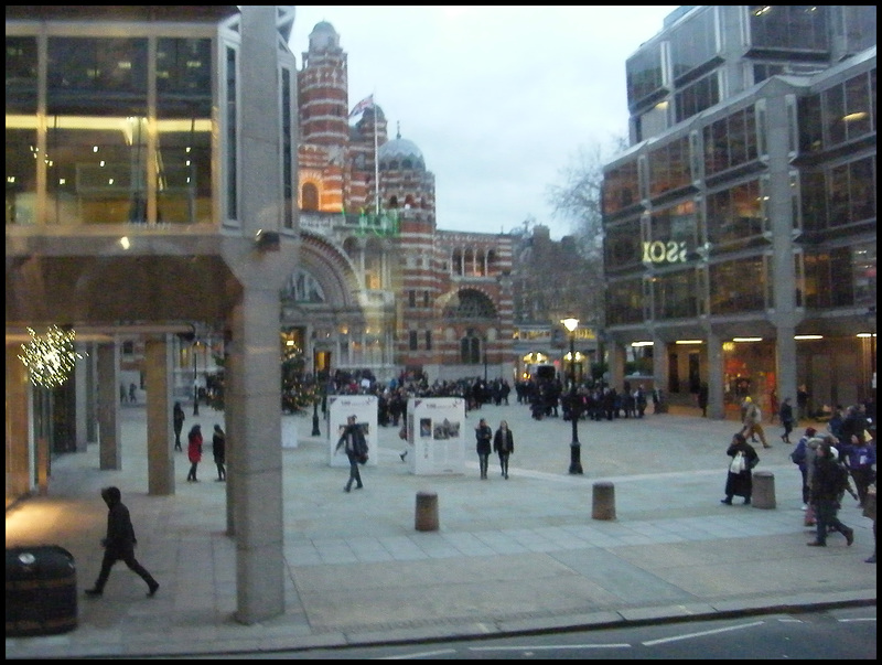 cathedral glimpsed amid blocks