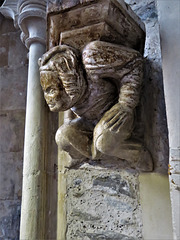 winchelsea church, sussex c14 atlas figure supporting a corbel on his back
