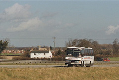 Ambassador Travel 887 (A101 HNC) on the A11 at Barton Mills – 18 Feb 1990 (111-8)