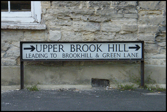 double-arrowed street sign