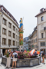 Place de la Palud, Fontaine de la justice ... P.i.P.  (© Buelipix)