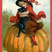 Halloween—Witch with a Black Cat on a Pumpkin